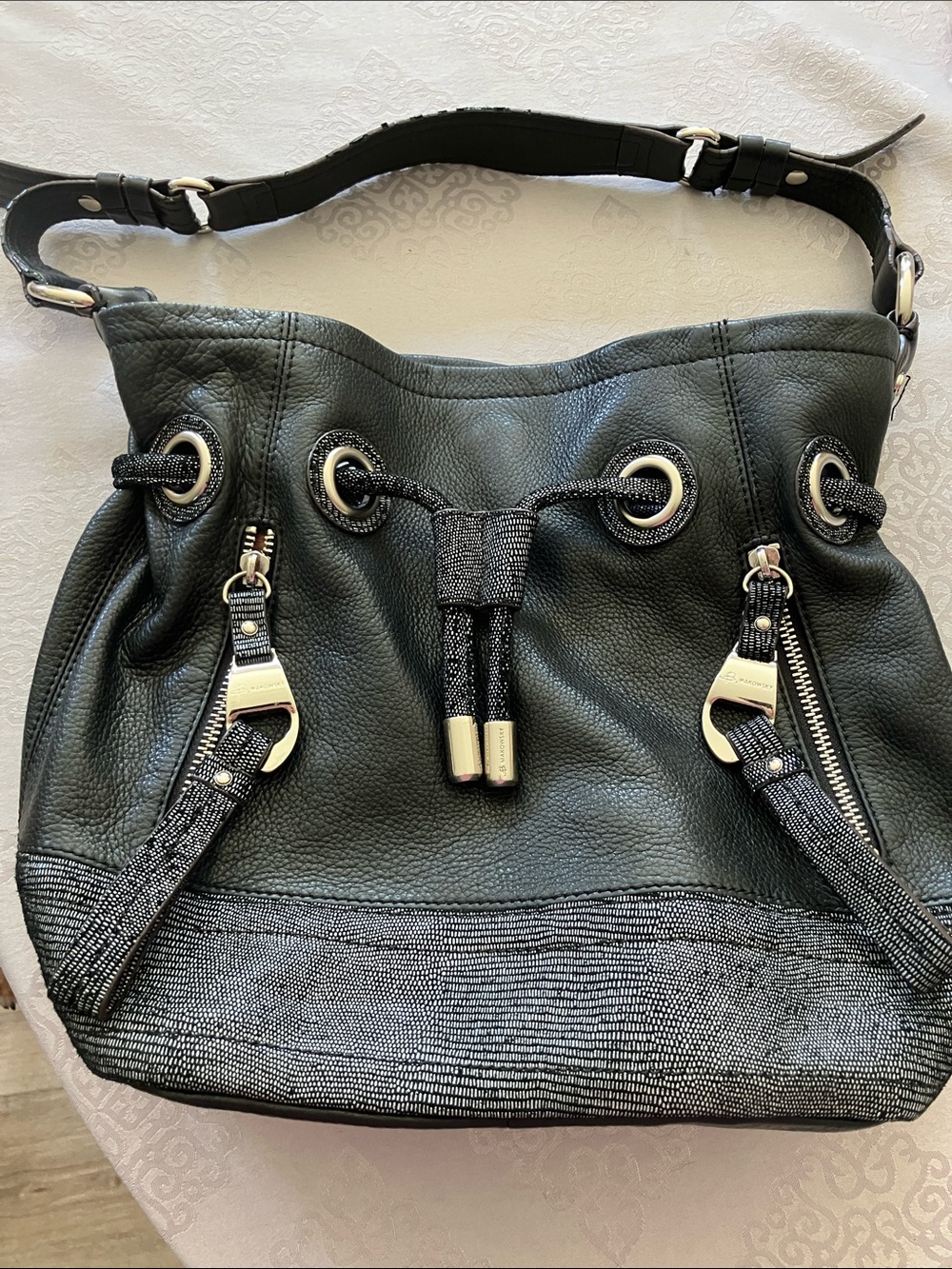 b. makowsky Black Leather Drawstring Shoulder Bag with Silver Accents